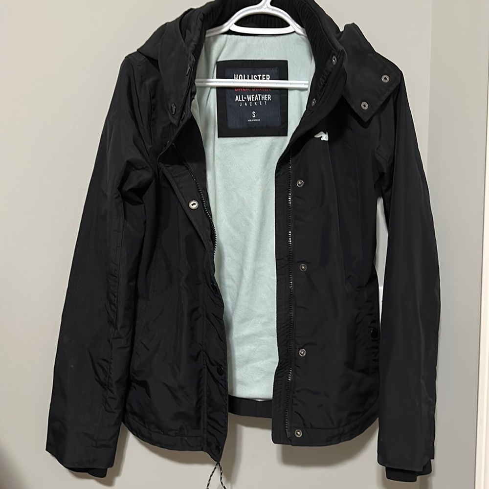 Hollister California All-Weather Jacket, small. Black exterior, blue interior.